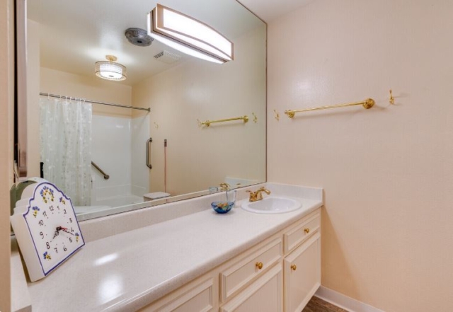 Studio Apartment Bathroom Vanity at The Oaks of Pasadena — Voted a Top Senior Facility by L.A. Magazine Elegant bathroom vanity in a studio apartment at The Oaks of Pasadena senior living community, offering modern fixtures and ample storage — recognized as a Top Senior Facility in 2024 by L.A. Magazine