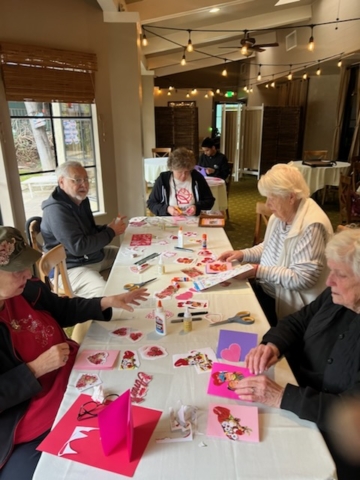 Annual Valentine’s Day Card-Making Event at The Oaks of Pasadena Senior Living Residents at The Oaks of Pasadena senior living community participating in the annual Valentine’s Day card-making activity, celebrating creativity and connection.