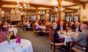 Restaurant-style dining at The Oaks of Pasadena senior independent living community with residents seated
